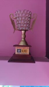 Trophy with decorative design and label